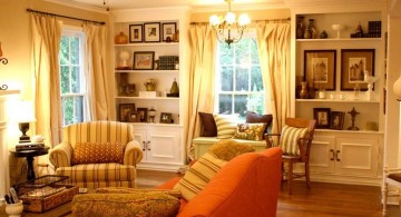 warm tuscan living room colors with bright orange sofa