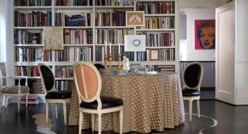 whole wall bookshelves in dining room